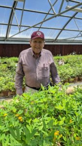 charles simpson in greenhouse